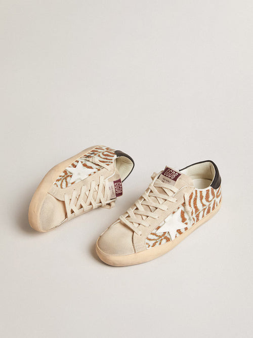 GOLDEN GOOSE Super-Star LTD in zebra-effect Swarovski with a white leather star | 黃金鵝 Super-Star LTD 斑馬紋效果施華洛世奇款，搭配白色皮革星星（白色）